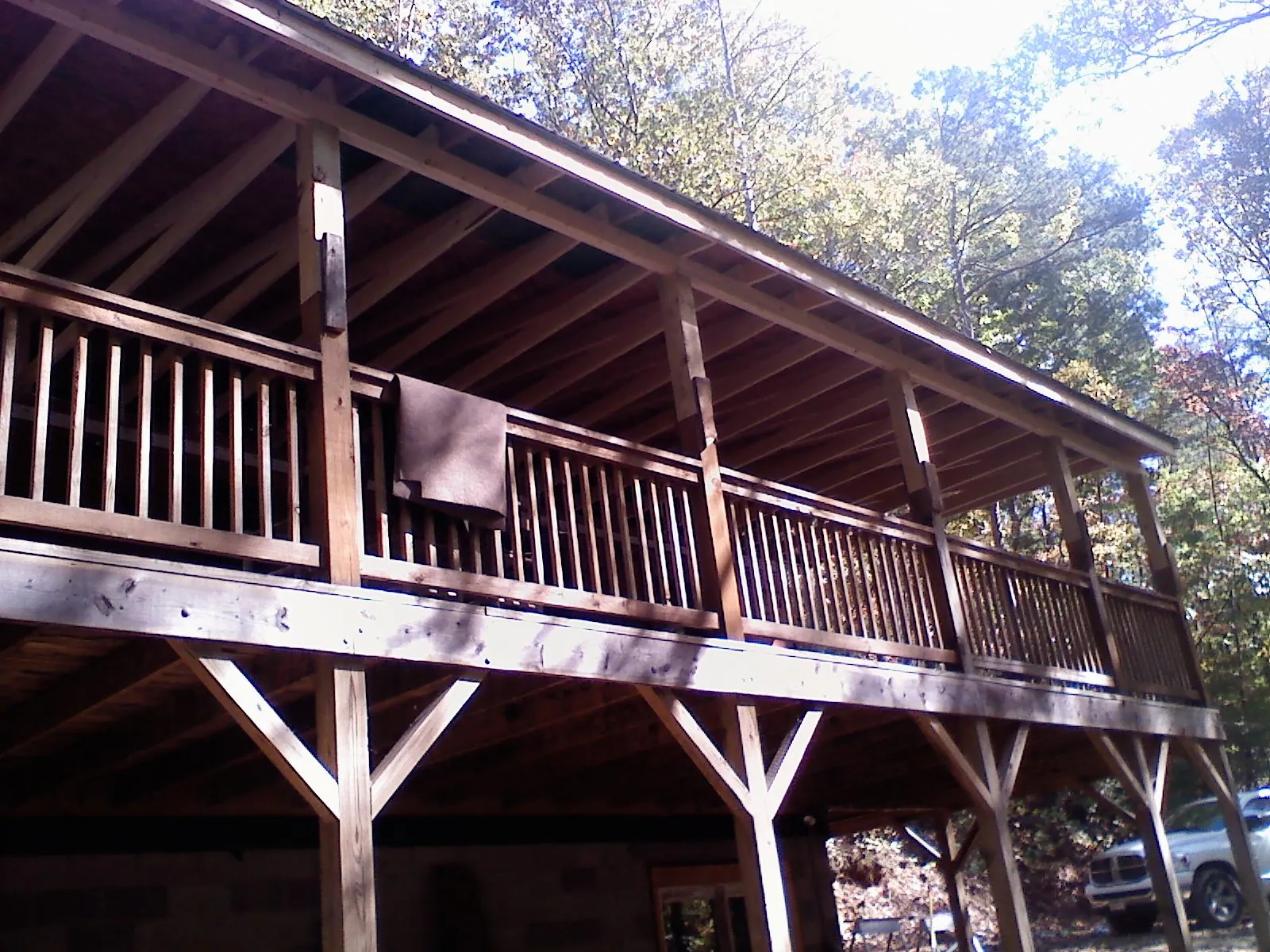 Timber framing under a new elevated porch and deck — Roof Leak Repair in Enfield by Roofing Brothers